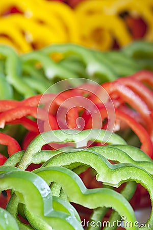 Fresh green red and yellow peppers Stock Photo