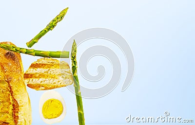 Fresh Grilled Bread, Asparagus and Egg. Ingridients for Breakfast. Equilibrium floating food. Balance levitation Food Stock Photo