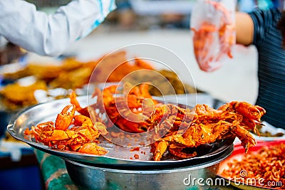 Fresh grilled crabs at market Stock Photo