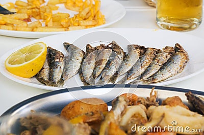 Fresh grilled sardines with vegetables Stock Photo