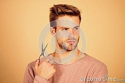 Fresh hairstyle. Barbershop concept. Barbershop salon. Personal stylist. Bearded man hold scissors. Modern barbershop Stock Photo