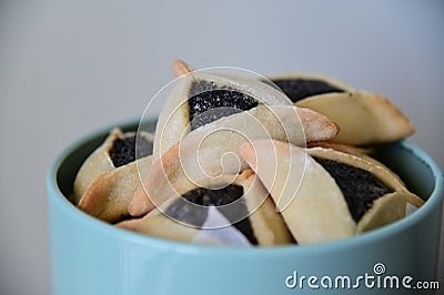 Fresh Hamantash cookies in a jar Stock Photo