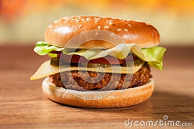 Fresh hamburger on wooden table Stock Photo