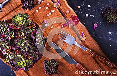 Fresh, healthy, colourfull Kalettes flower sprout on wooden background Stock Photo