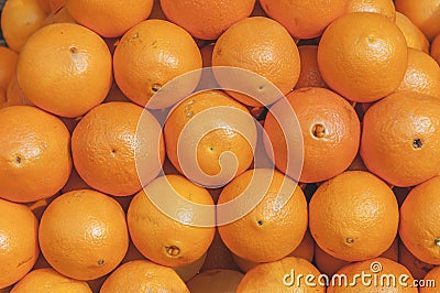 Fresh helathy sweet citrus pile Orange on market ready for selling Stock Photo