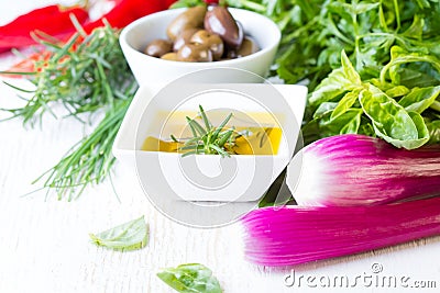 Fresh herbs, oil, olives and seasoning. healthy food concept Stock Photo