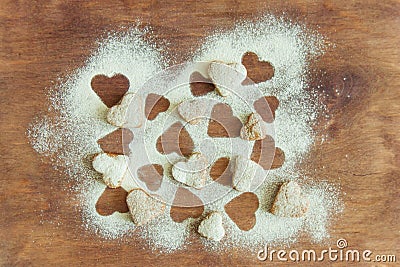 Young child hands is preparing the dough, bake cookies in the kitchen. Close up concept of family leasure Stock Photo