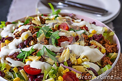 Homemade taco salad in a large bowl Stock Photo
