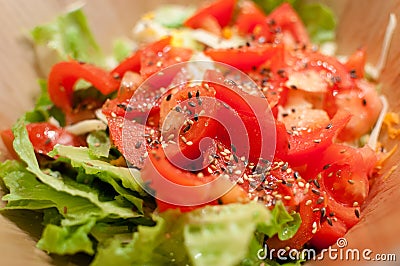 Fresh homemade tomato and lettuce salad Stock Photo