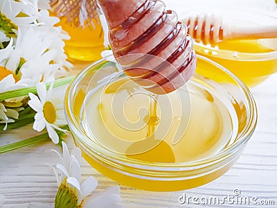 Fresh honey daisy flower vitamin wooden background delicious Stock Photo