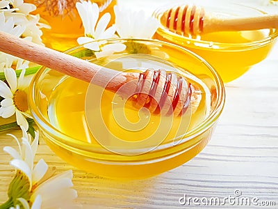 Fresh honey daisy flower nutrition vitamin wooden background delicious Stock Photo