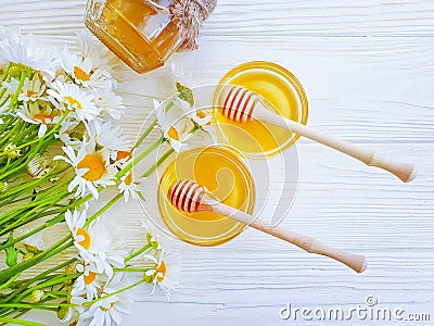 Fresh honey daisy flower healthy dessert nutrition vitamin wooden background delicious Stock Photo