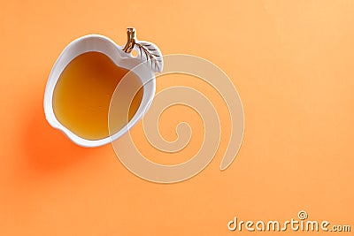 Fresh honey in a glass bowl. Top view,copy space, vivid background. Minimal style. Stock Photo