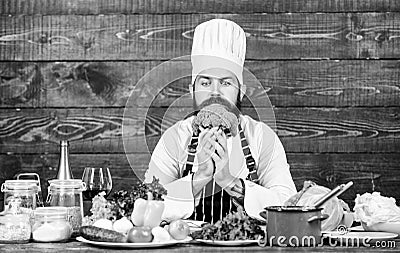 Fresh ingredients only. Culinary recipe concept. Man bearded hipster cooking fresh vegetables. Freshest possible Stock Photo