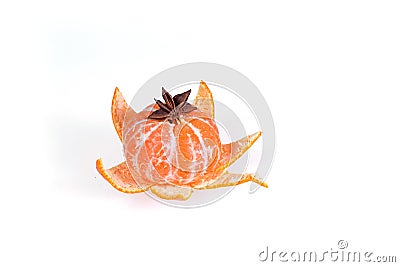 Fresh juicy bright mandarin decorated with anise and vanilla sticks on a white background. Stock Photo