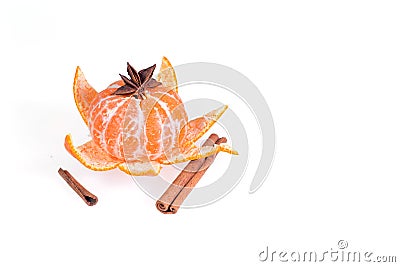 Fresh juicy bright mandarin decorated with anise and vanilla sticks on a white background. Stock Photo