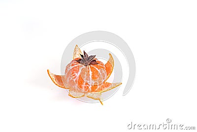 Fresh juicy bright mandarin decorated with anise and vanilla sticks on a white background. Stock Photo