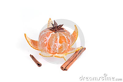 Fresh juicy bright mandarin decorated with anise and vanilla sticks on a white background. Stock Photo