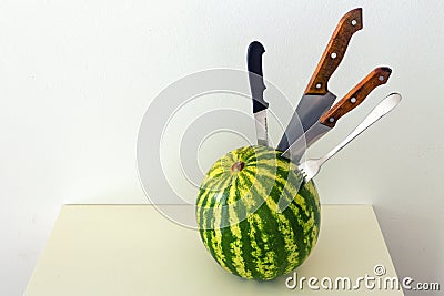 Juicy whole watermelon with knifed knive / concept Stock Photo