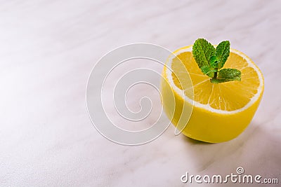 Fresh lemon with branch of mint Stock Photo