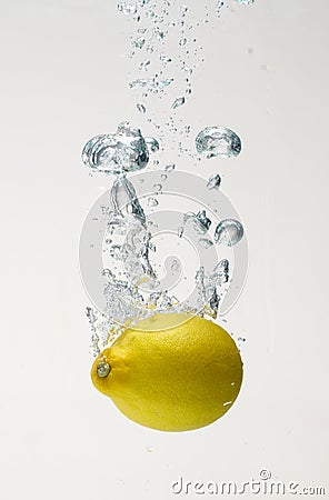 Fresh lemon drop on water with babble Stock Photo