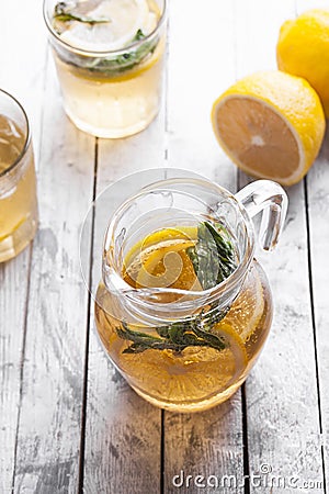 Fresh lemonade in a glass jug Stock Photo