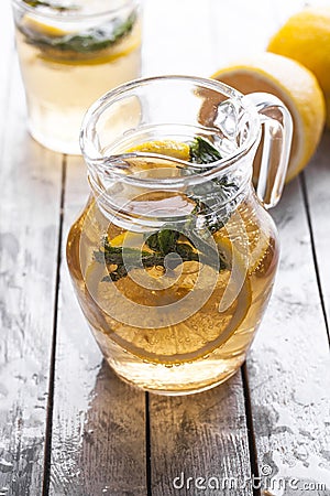 Fresh lemonade in a glass jug Stock Photo