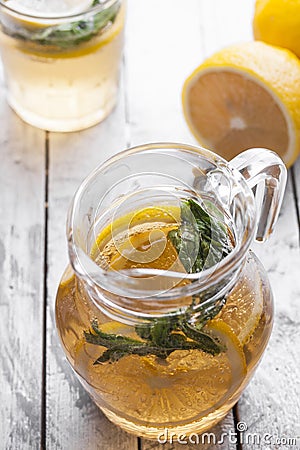 Fresh lemonade in a glass jug Stock Photo