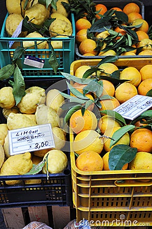 Fresh lemons, oranges and other fruits and vegetables on a street market in Sorrento, Amalfi Coast in Italy Stock Photo