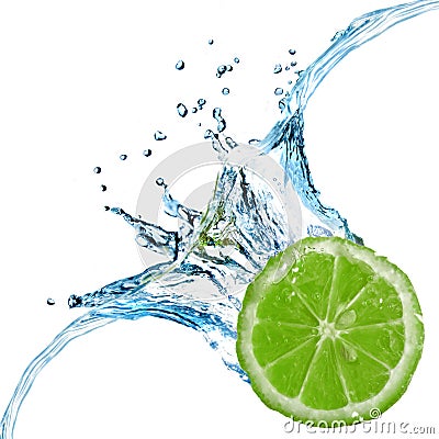 Fresh lime dropped into water with splash Stock Photo