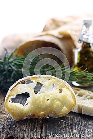 Fresh Loaf of Ciabatta Bread , Sliced on a Wooden Board Stock Photo