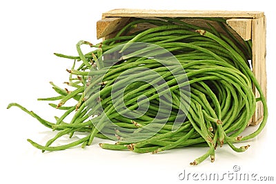 Fresh long beans in a wooden crate Stock Photo