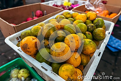 Fresh mandarins on a local organic food market. Bali island, Indonesia. Stock Photo