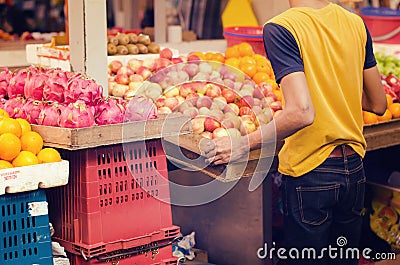 Fresh market activities over beautiful color combination,variety of fresh fruits background display at market stall. Editorial Stock Photo