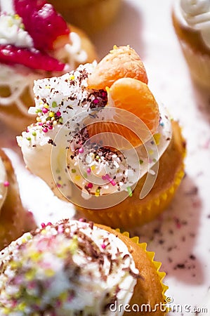 Fresh muffin with tangerine and cream Stock Photo