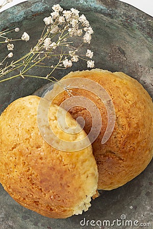 Fresh muffin in white background and old copper bowl Stock Photo