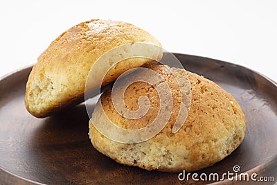 Fresh muffin on a wooden serving board Stock Photo