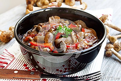 Fresh mushroom stew with red pepper and parsley Stock Photo