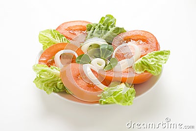 Fresh natural salad bowl tomato lettuce onion Stock Photo