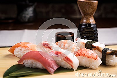 Fresh nigiri sushi in a plate in a japanese restaurant Stock Photo