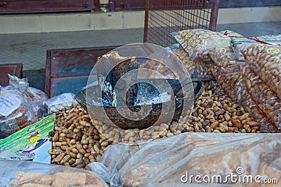 nuts assortment ready to eat in Rishikesh street market Stock Photo