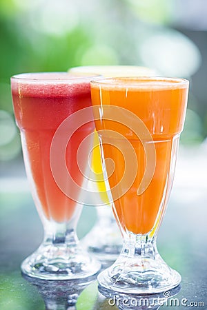 Fresh orange carrot and watermelon fruit juice Stock Photo