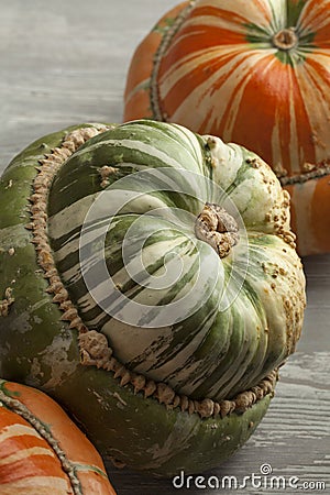 Fresh orange and green Turban squashes Stock Photo