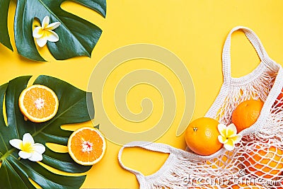 Fresh oranges in a eco bag. Cutted citrus fruit for healthly food. Stock Photo