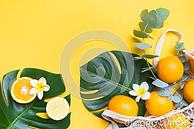 Fresh oranges in a eco bag. Cutted citrus fruit for healthly food. Stock Photo