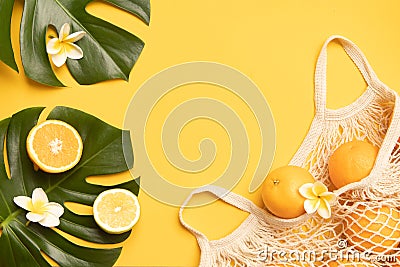 Fresh oranges in a eco bag. Cutted citrus fruit for healthly food. Stock Photo