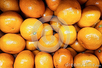 fresh oranges piled up in a box Stock Photo