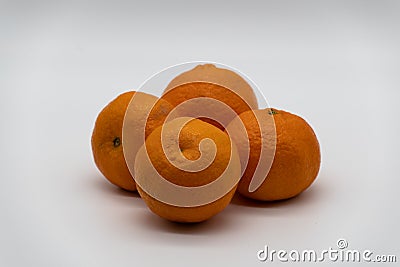 Four fresh tangerines with a white background Stock Photo