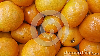 Fresh oranges in supermarket for sale, pile of orange in market for texture.. Stock Photo