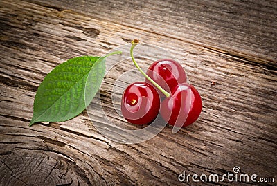 Fresh organic cherry, fruit with leaves Stock Photo